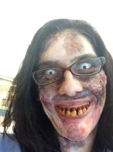 Final phase of zombie makeup, this time with my reading glasses and fake teeth